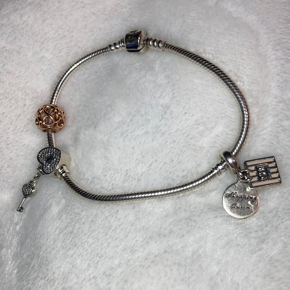 Authentic Pandora bracelet with authentic Charms